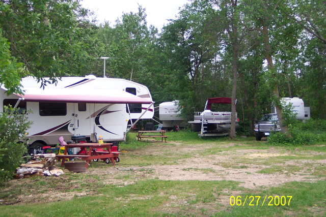 RV sites are all treed for privacy yet close enough for you to visit each other: Close to the docks and boat launch too