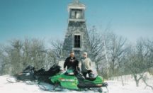Snowmobiling and sight seeing is a great way to spend a winter's day: You can visit 2 lighthouses by snowmobile.